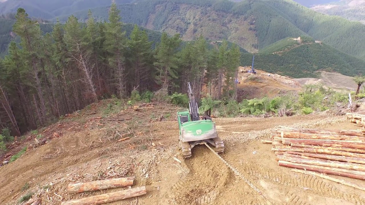 John Deere 2454D & Falcon Winch Assist Logging - Drone Flyover on Steep Slope Harvesting