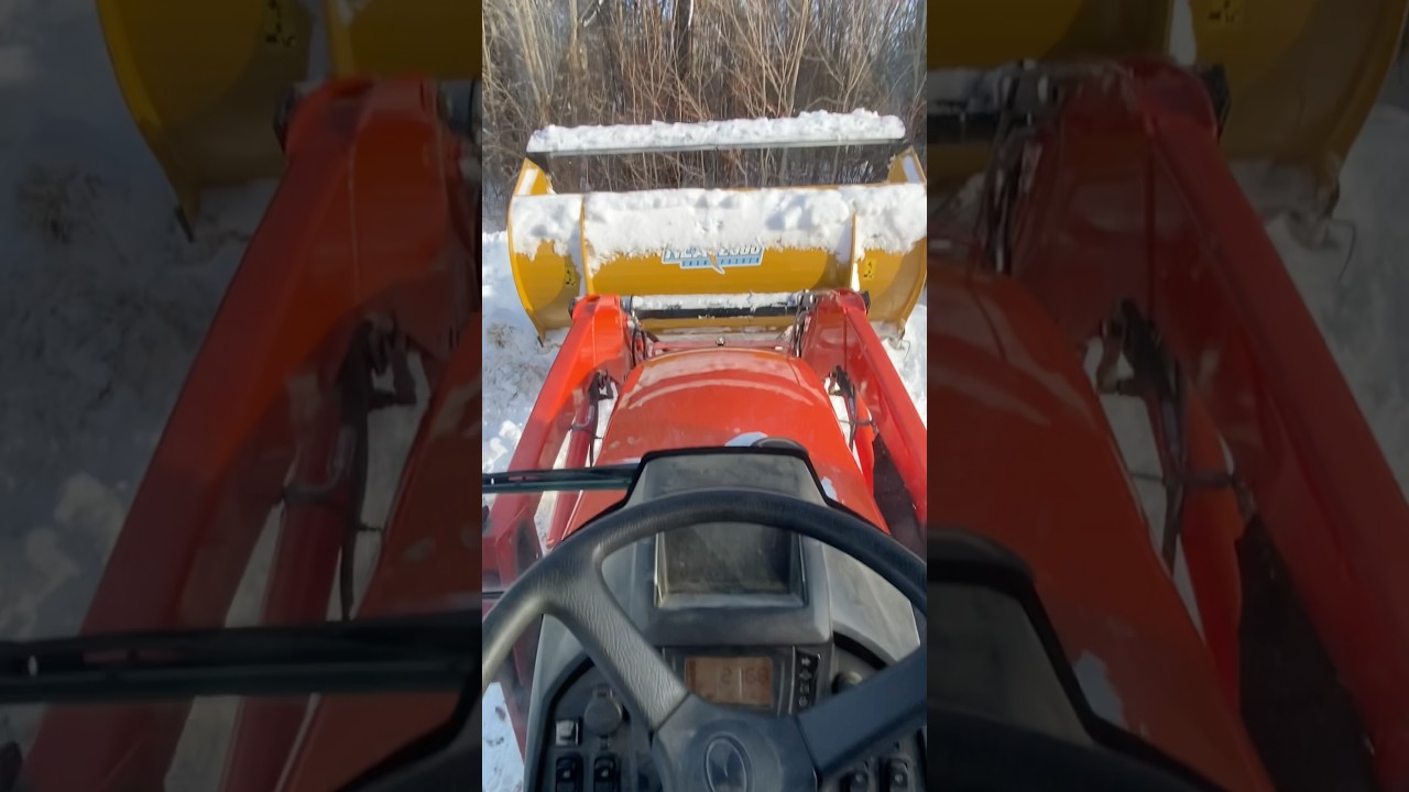 Oversized snow pusher for Kubota LX2610 