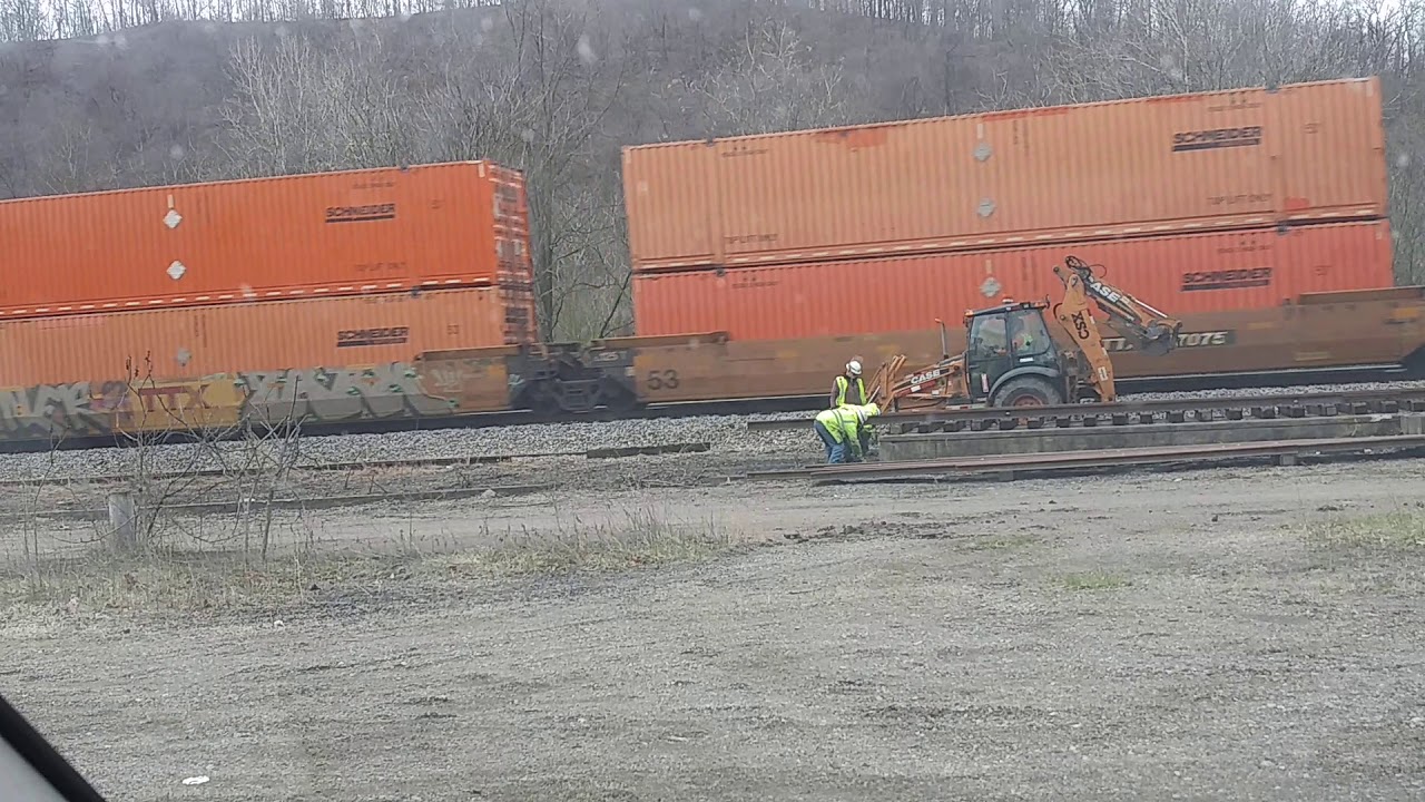 A COUPLE OF CSX TRAINS AND MORE SIDING WORK THE OLD PATRAIN SIDING