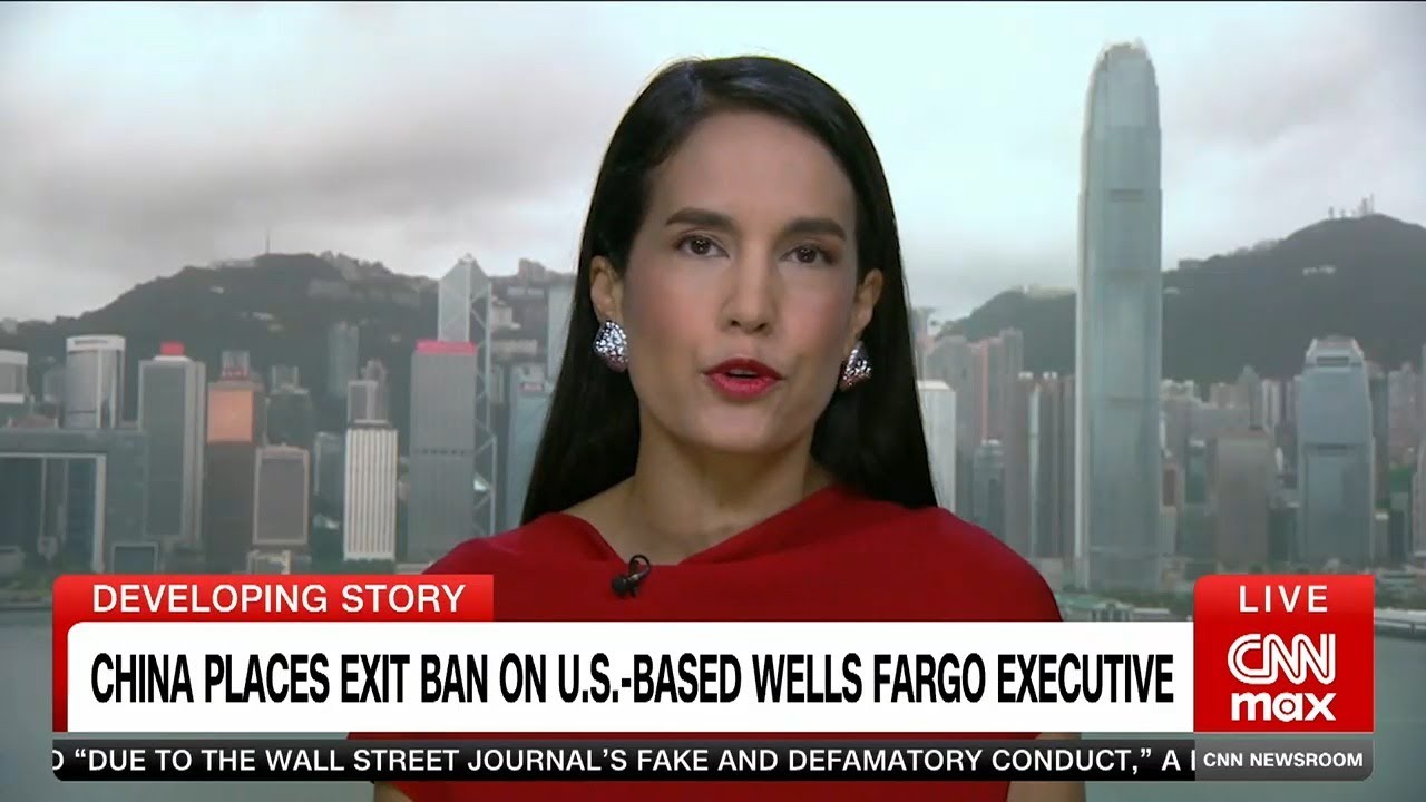 China bans two Americans from leaving the country