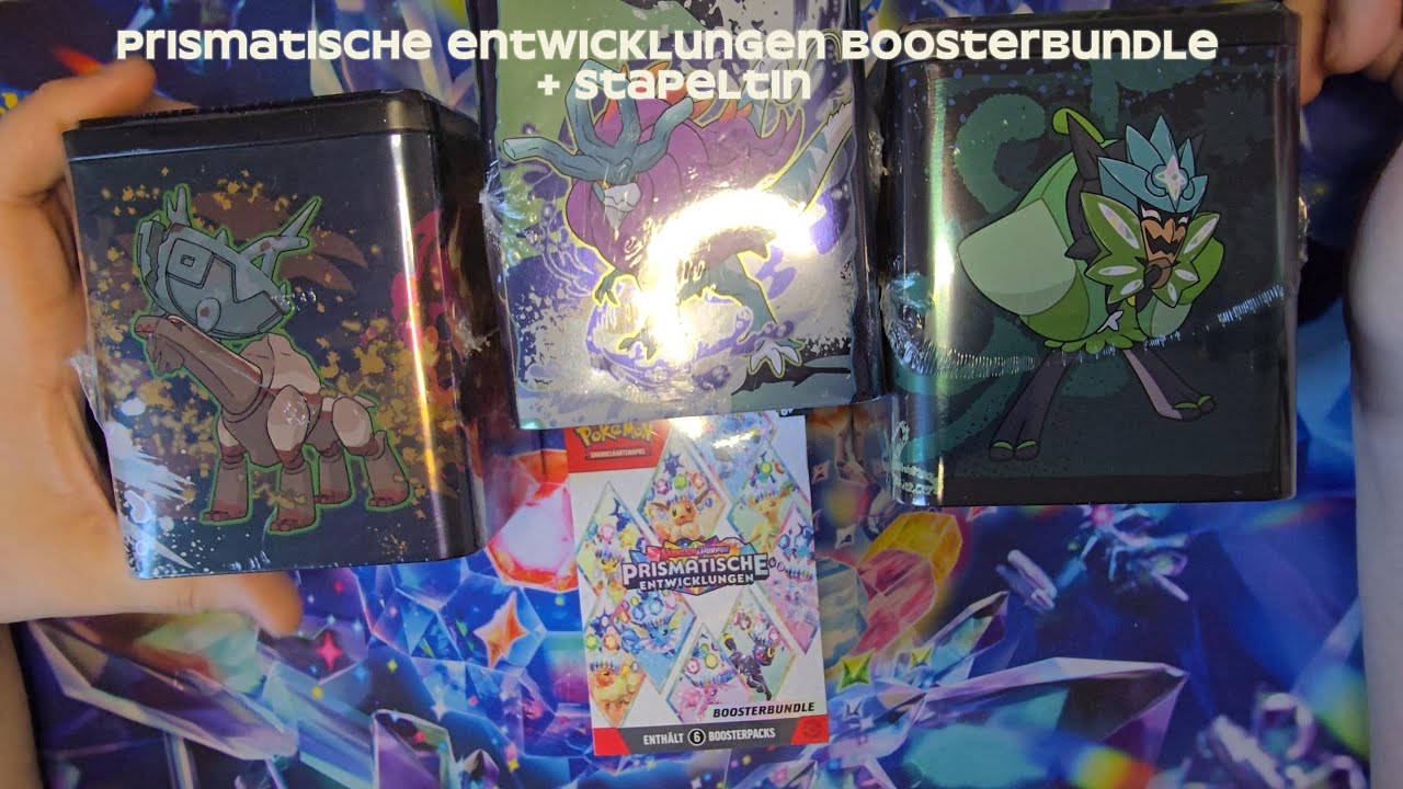 Prismatische Entwicklung Boosterbundle + Stapeltins 2025