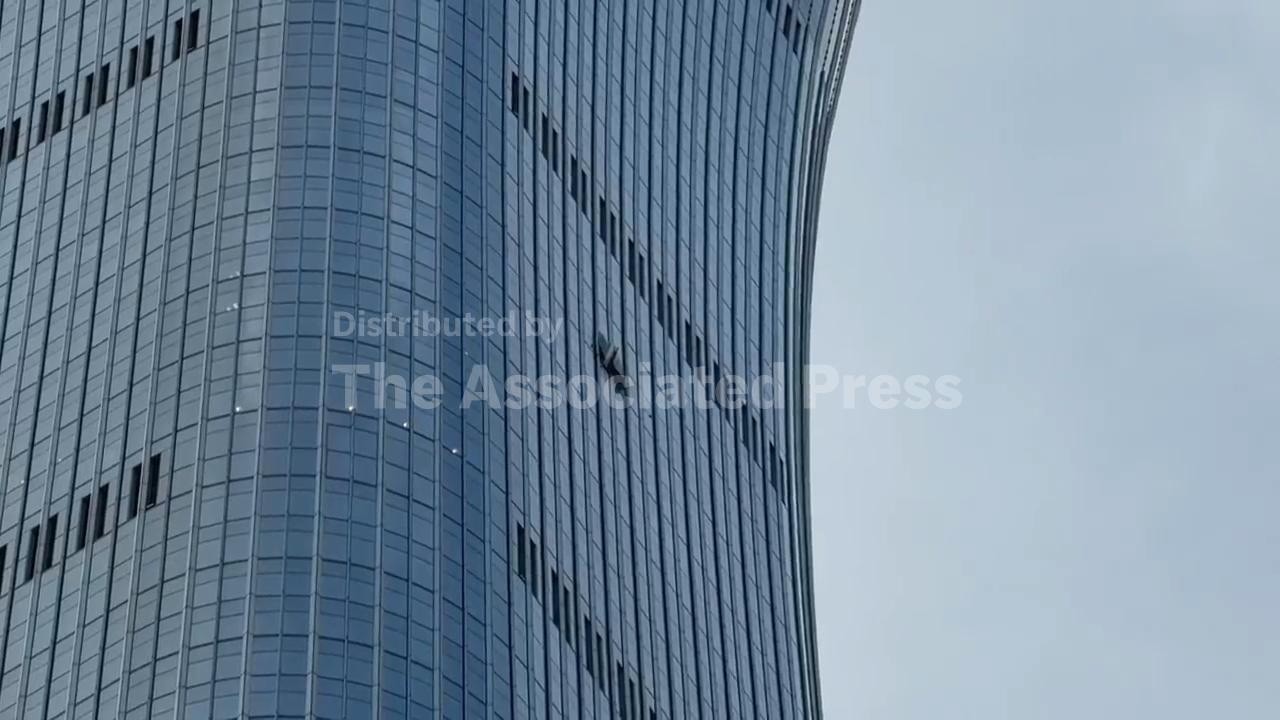 Tallest building in Beijing is damaged after small airplane reportedly crashed into it