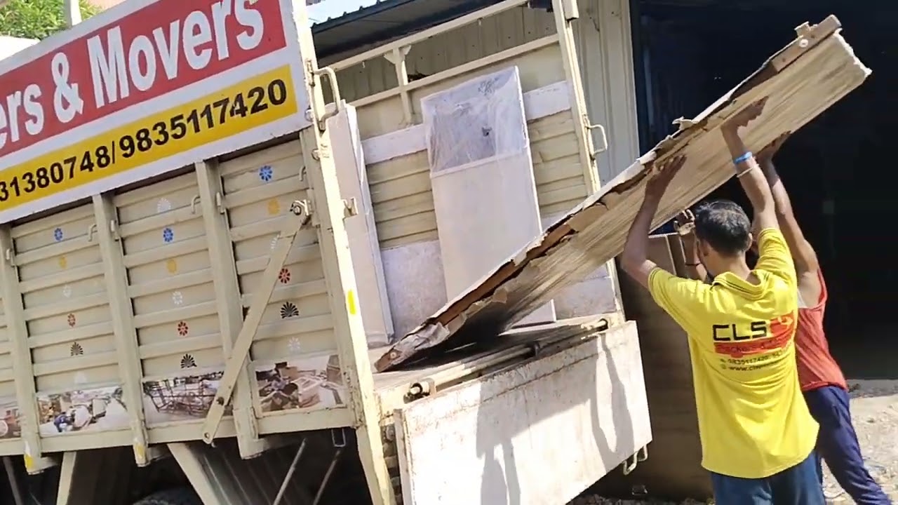household goods loading from godown to vehicle for transporting