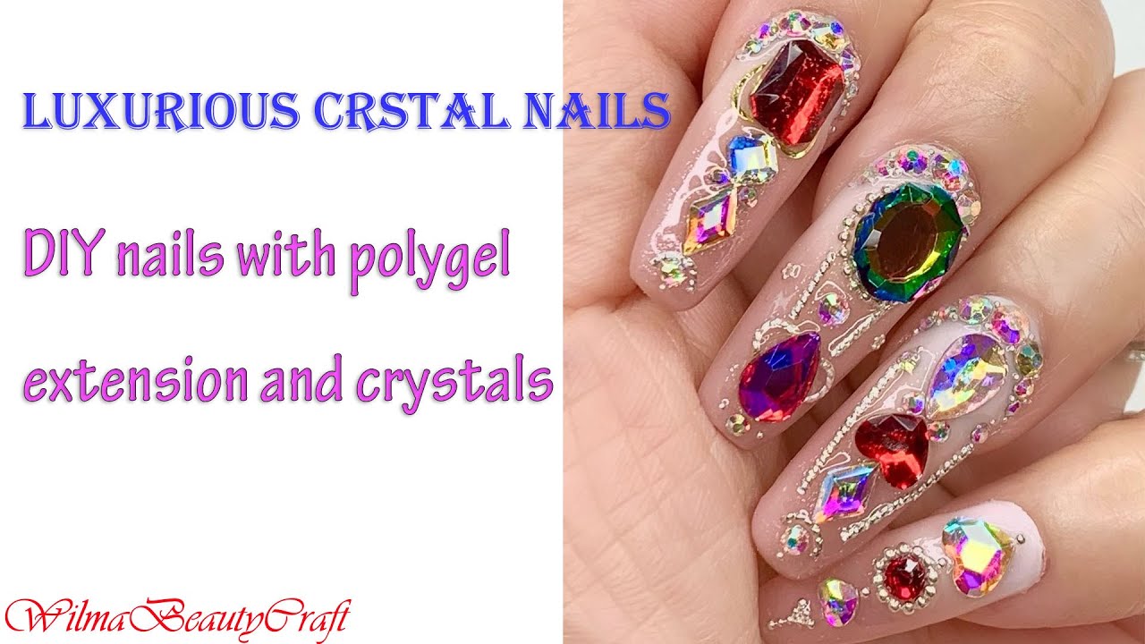 Luxurious crystal nail art ombre polygel extension decorate with nail crystals