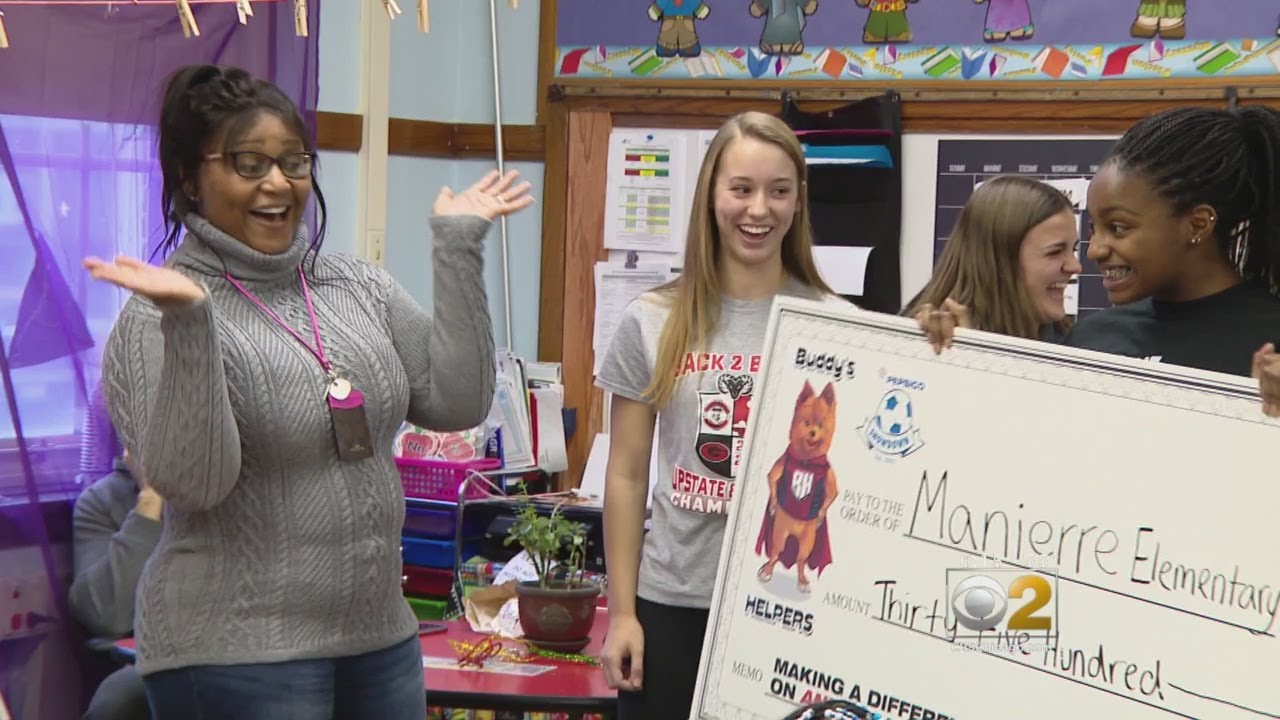 High School Athletes Surprise Teacher With Check, Supplies For Classroom