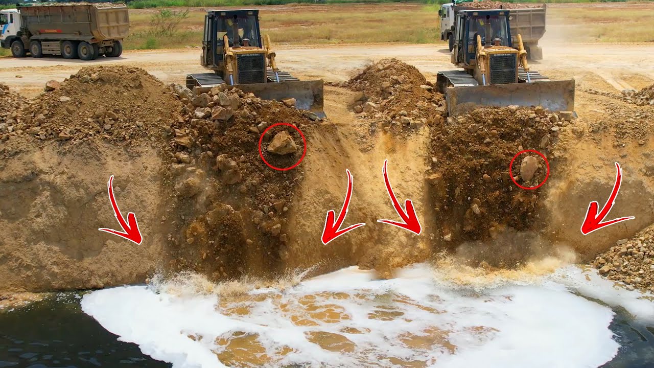 Be Incredible Skills Dozers to push the soil into the lake with trucks worked together to dump soil