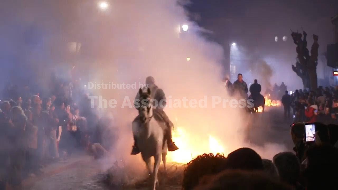 Horses leap through flames as part of Spanish ritual to honor St. Anthony, AP explains