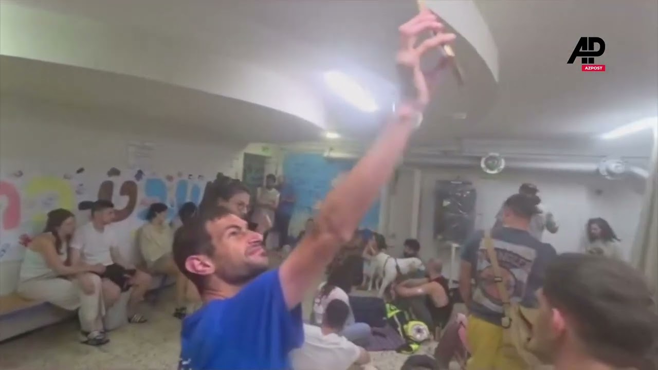 Residents and their pets take shelter in Tel Aviv amid Iranian missile attacks