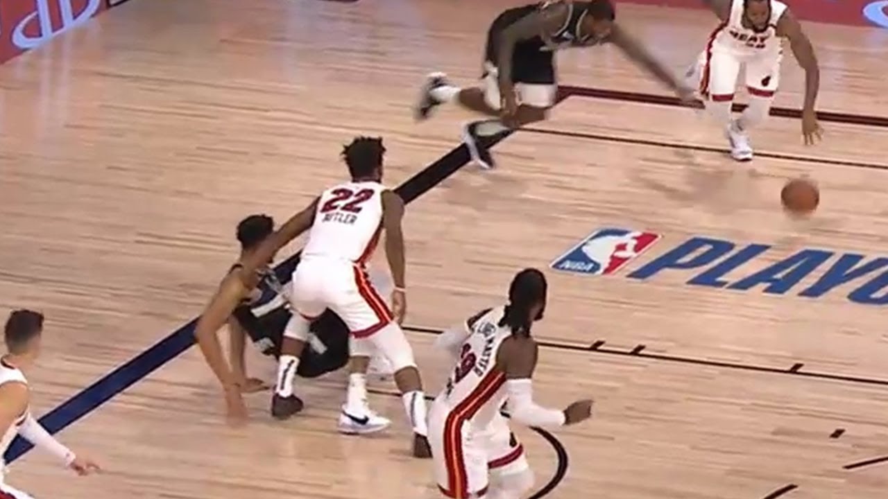 Jimmy Butler Pulls The Chair On Giannis & Pushes Him Back Down When He Tries To Get Up