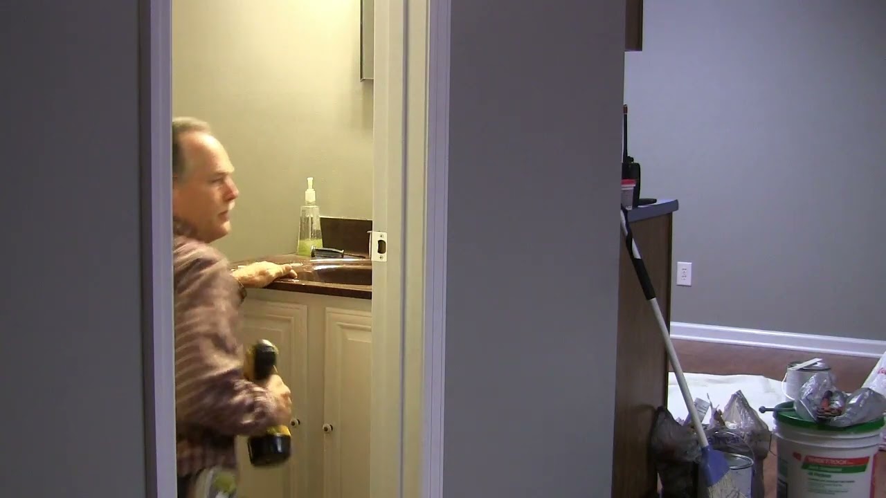 How to adjust a door strike plate