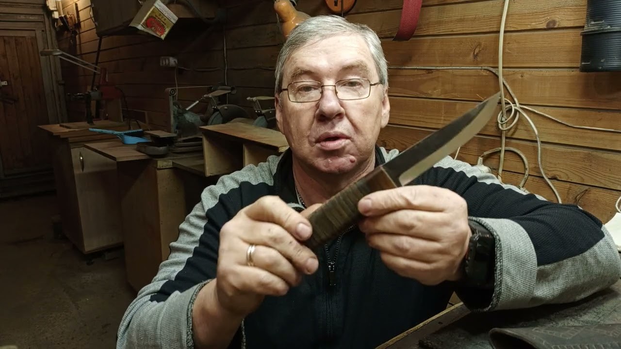 Нож из мех-пилы с рукоятью из кожи. 