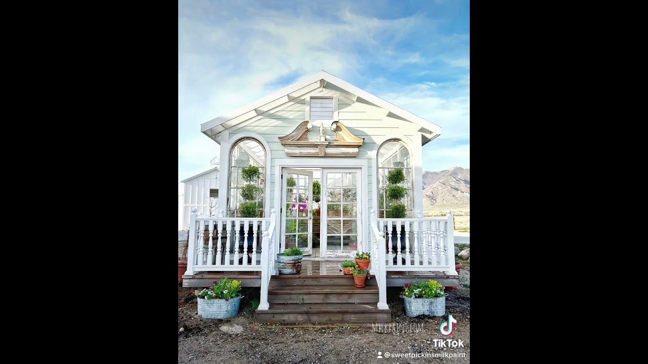 We built a greenhouse with old windows that I collected for years!  #sweetpickins #diy #greenhouse
