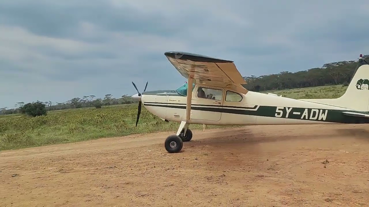 Kenya Wildlife Service bush plane taking off at Lake Nakuru National Park, Kenya 🇰🇪🇰🇪🇰🇪. enjoy!!