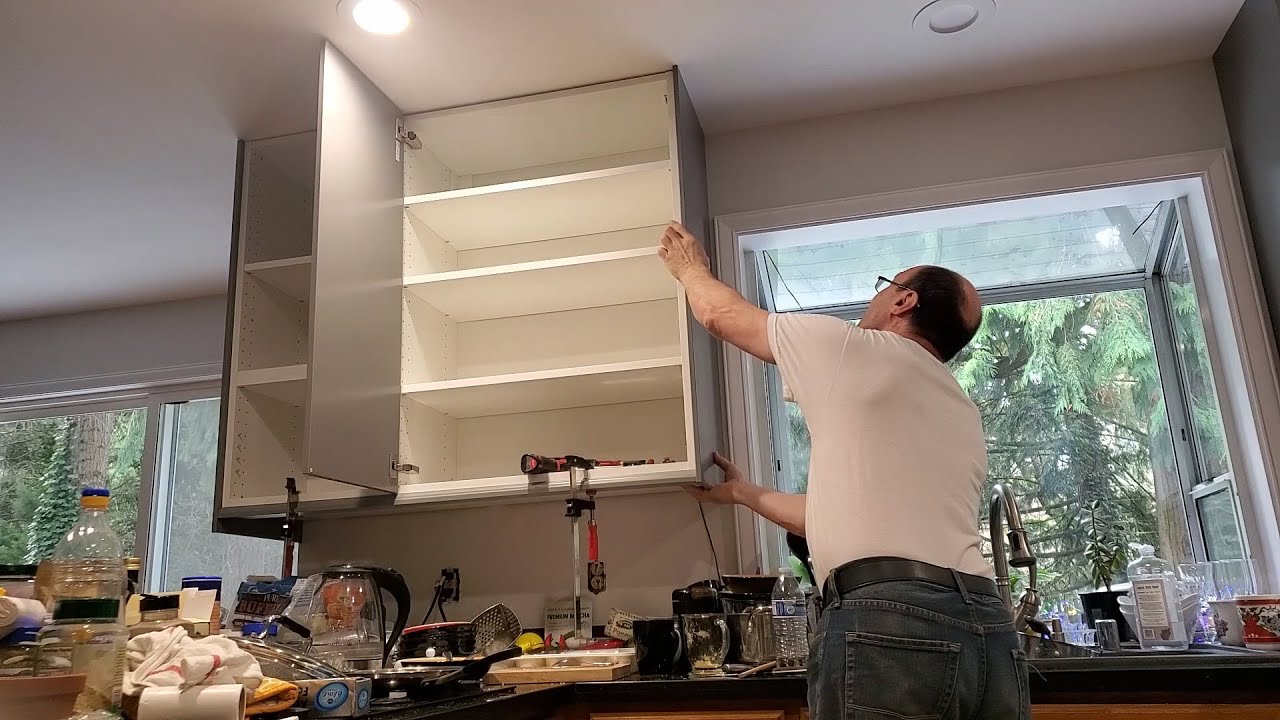 Under cabinet IKEA trim and side panel. Кухня IKEA, установка боковых панелей
