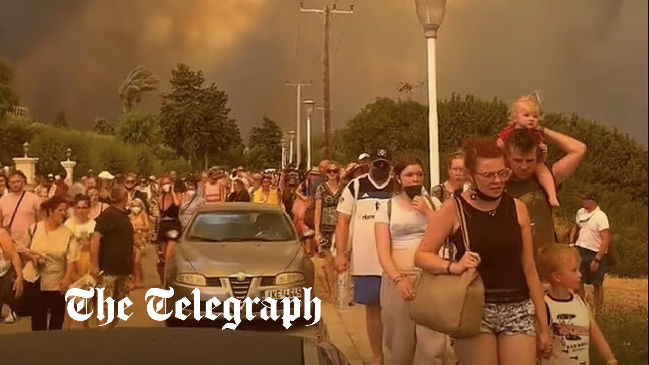 Holidaymakers flee as wildfires sweep across Rhodes