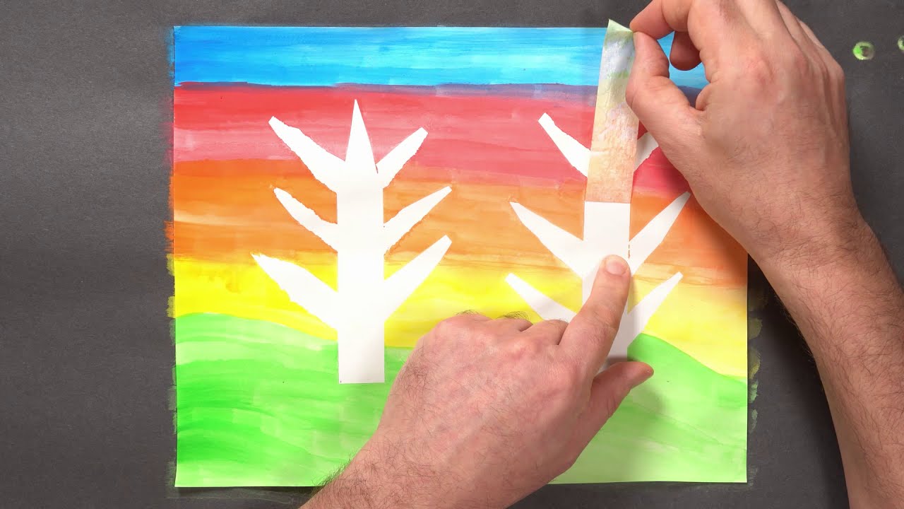 Creating a winter sunrise painting using watercolour paint and charcoal