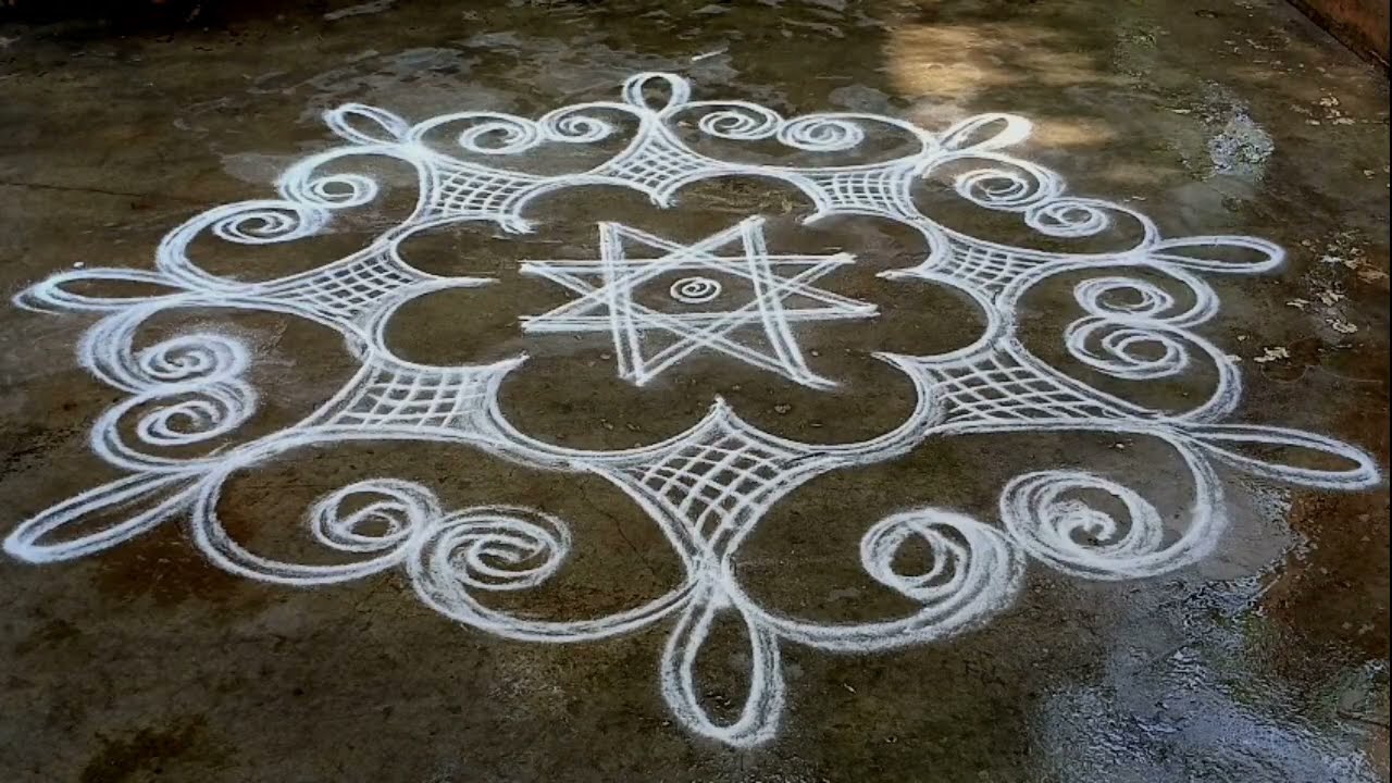 Simple star rangoli , easy kolam with net design