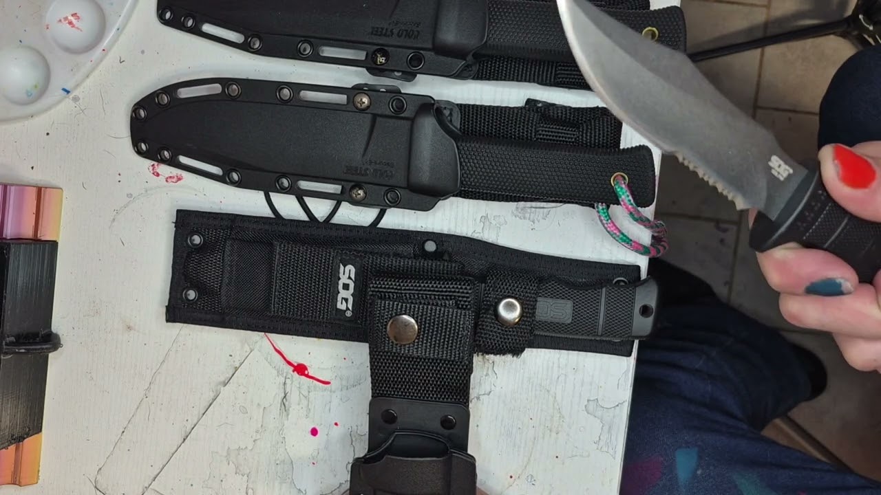 SOG Seal pup with kydex and ballistic nylon sheaths.
