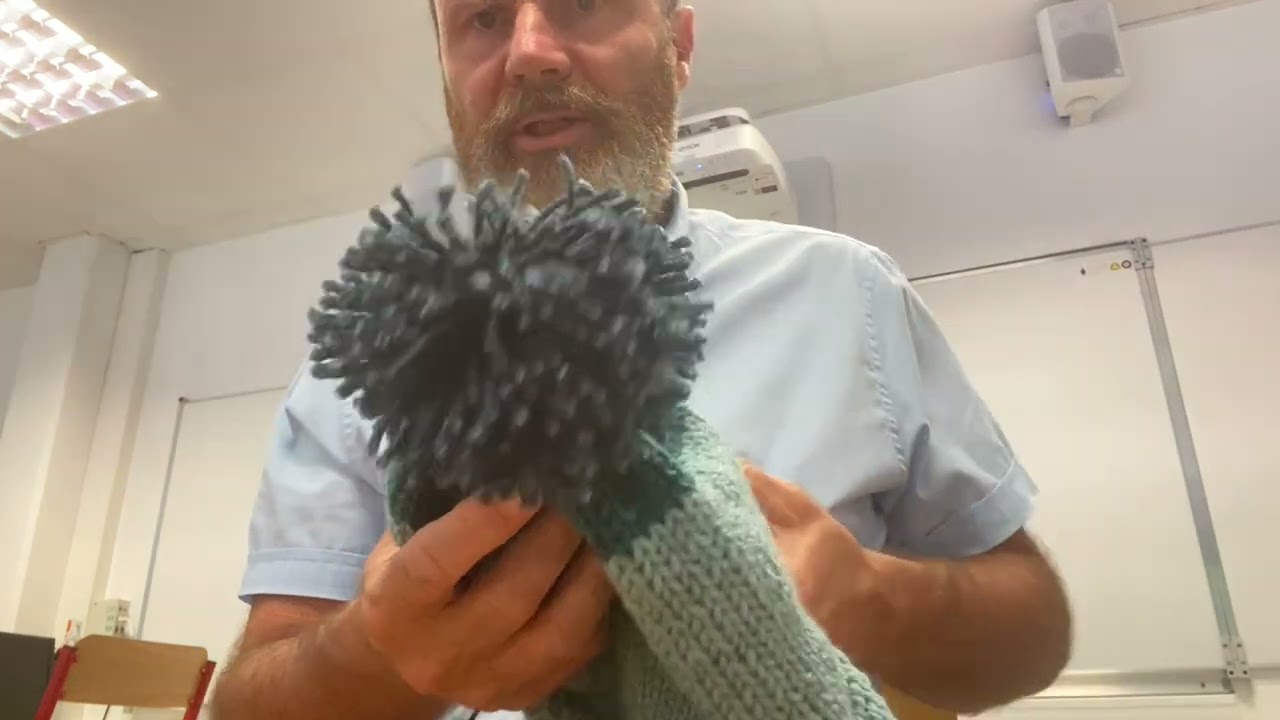 5.  Bonnet : fixation du pompon