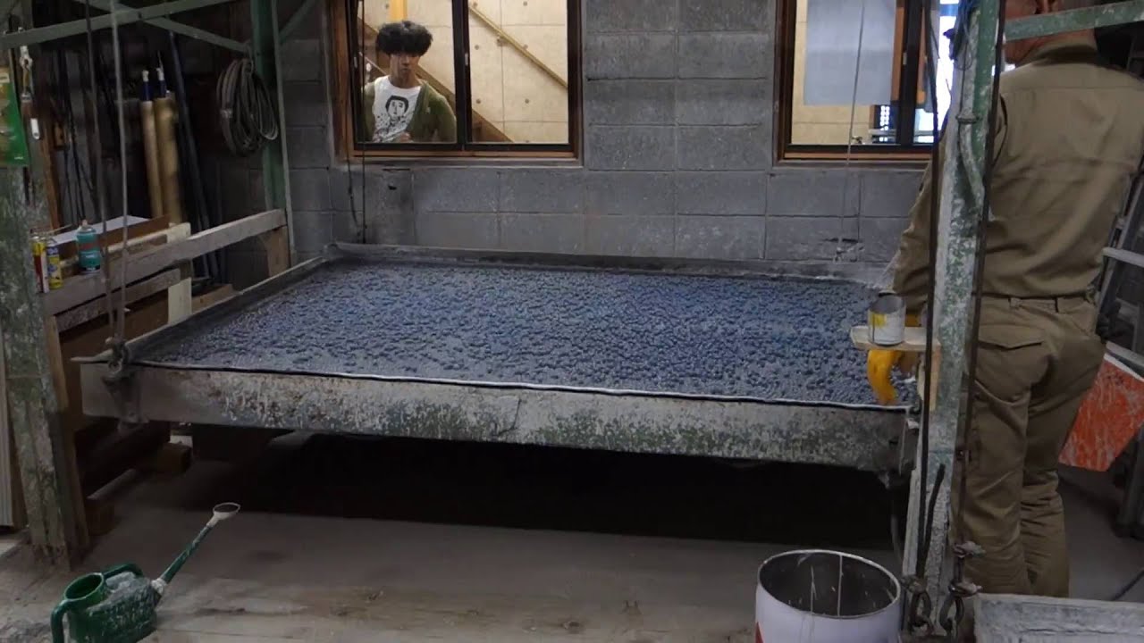 Aluminium plates being grained