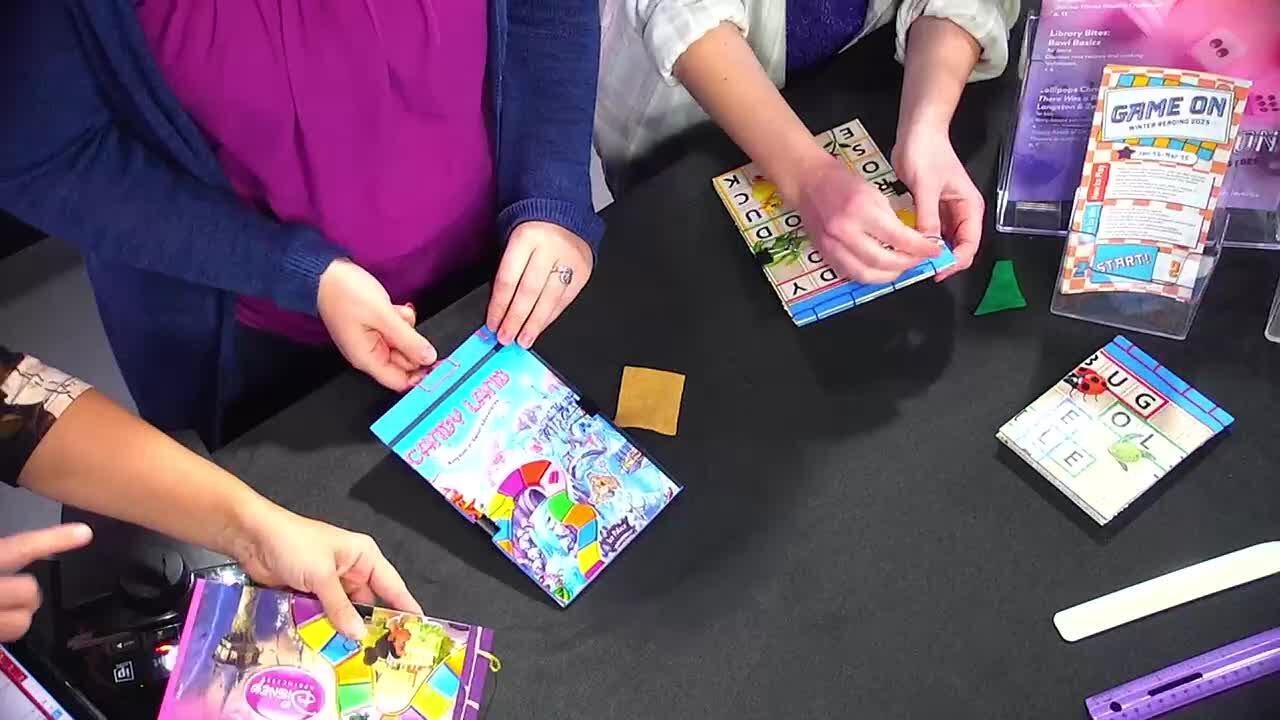 Make a journal using upcycled board games