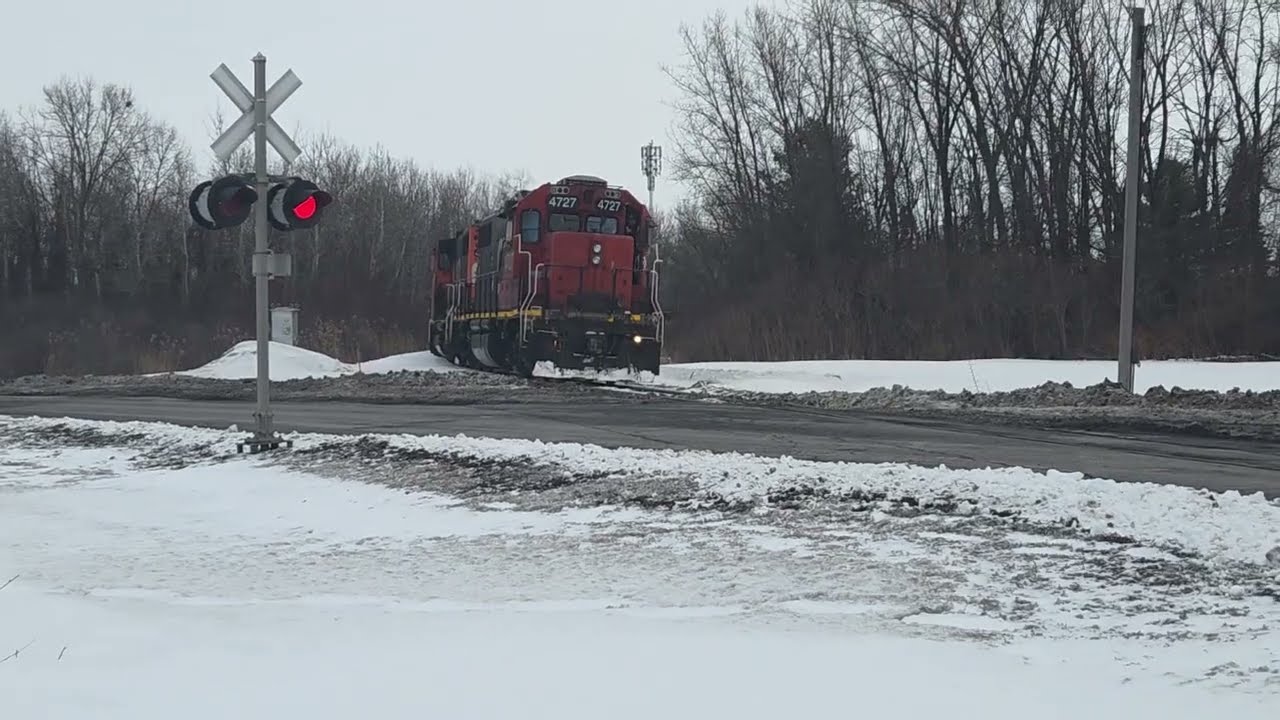 Crossing Flagged! Hot Leader! Cn 4727 leading cn 522 through st hubert