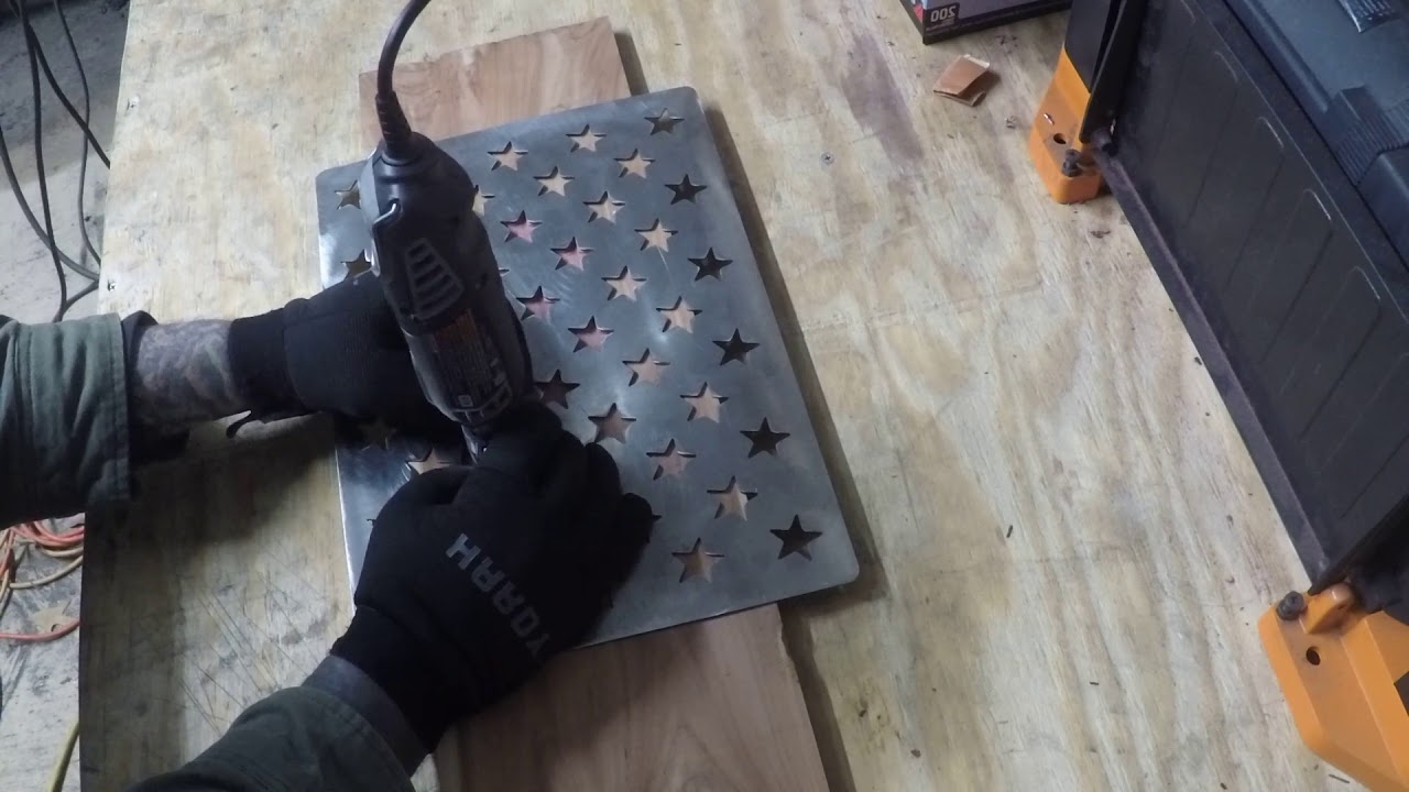 Using a Dremel to router out the stars on the The Midgard Workshop star template