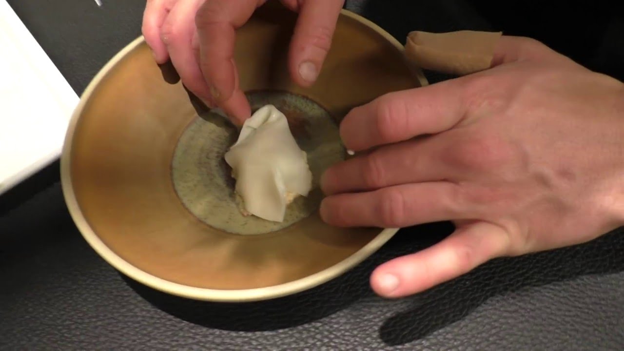 Jan Tournier prepares a starter with lobster at the Michelin star Cuchara in Belgium