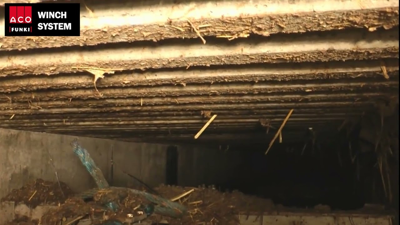 Scraper system for pig barns - a simple solution to remove straw from the manure channels
