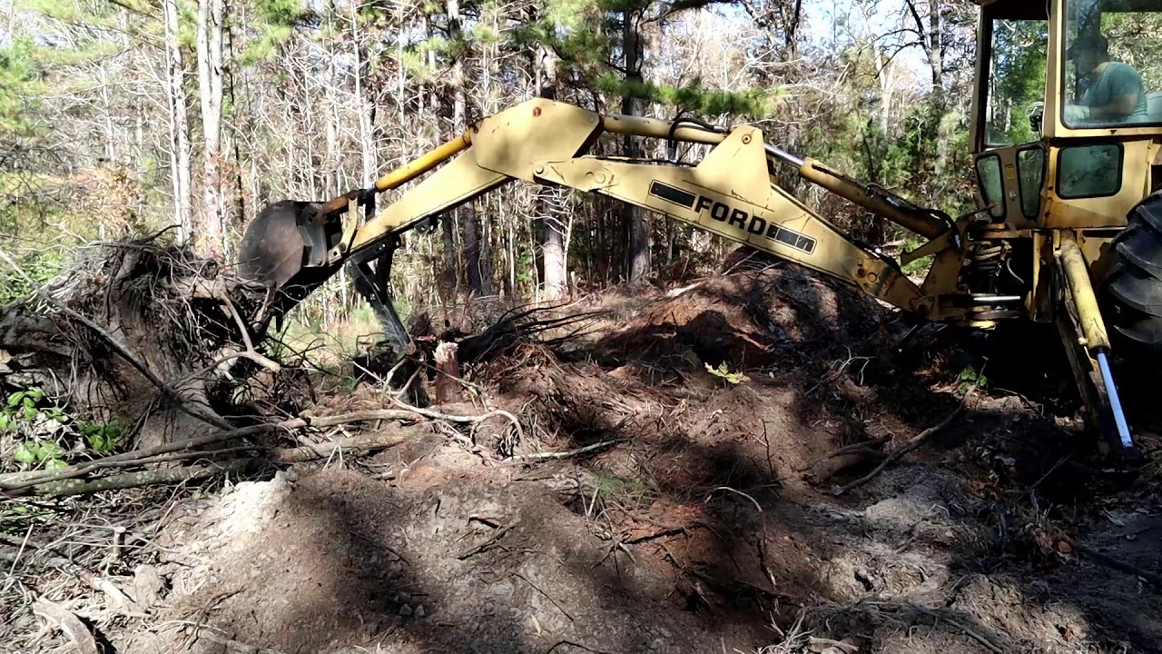 Building A Road Through The Woods With A Ford 555 Backhoe