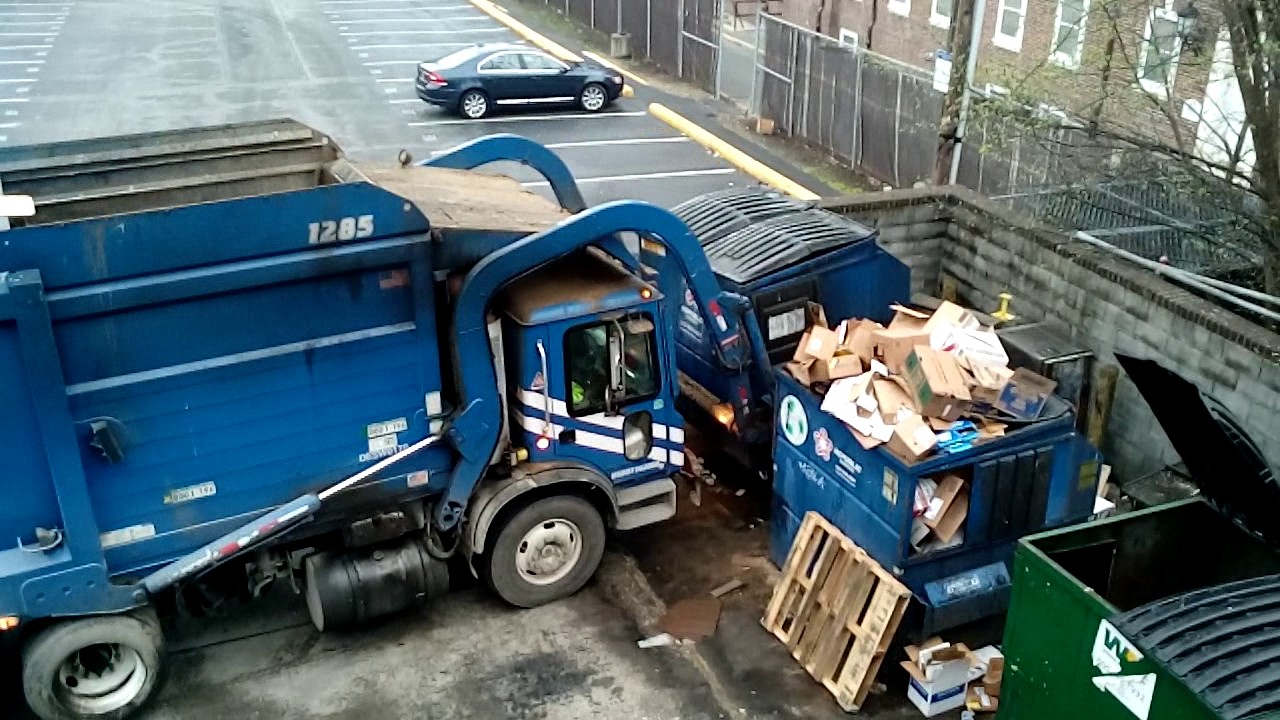 Lots of garbage trucks