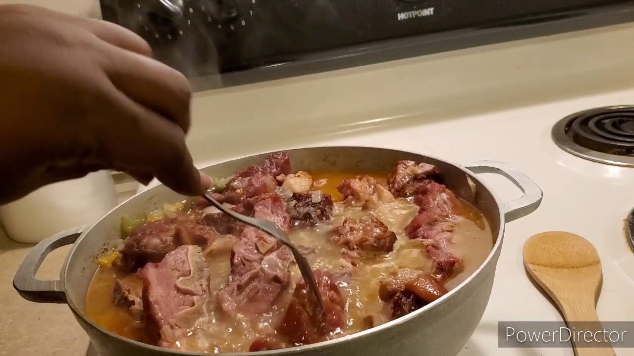 Collard Greens with smoked pigtails and neck bones