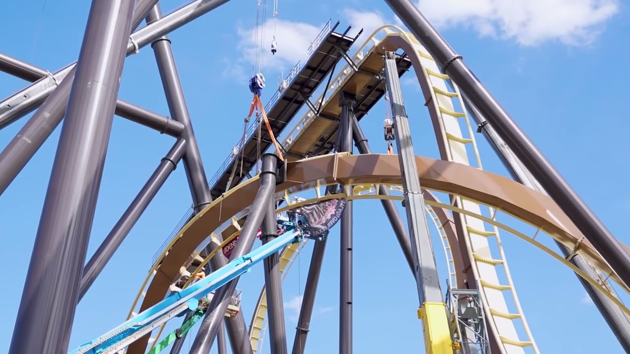 Final piece of track for Tormenta  Giga Coaster  has been lifted into place. Six Flags Over Texas.