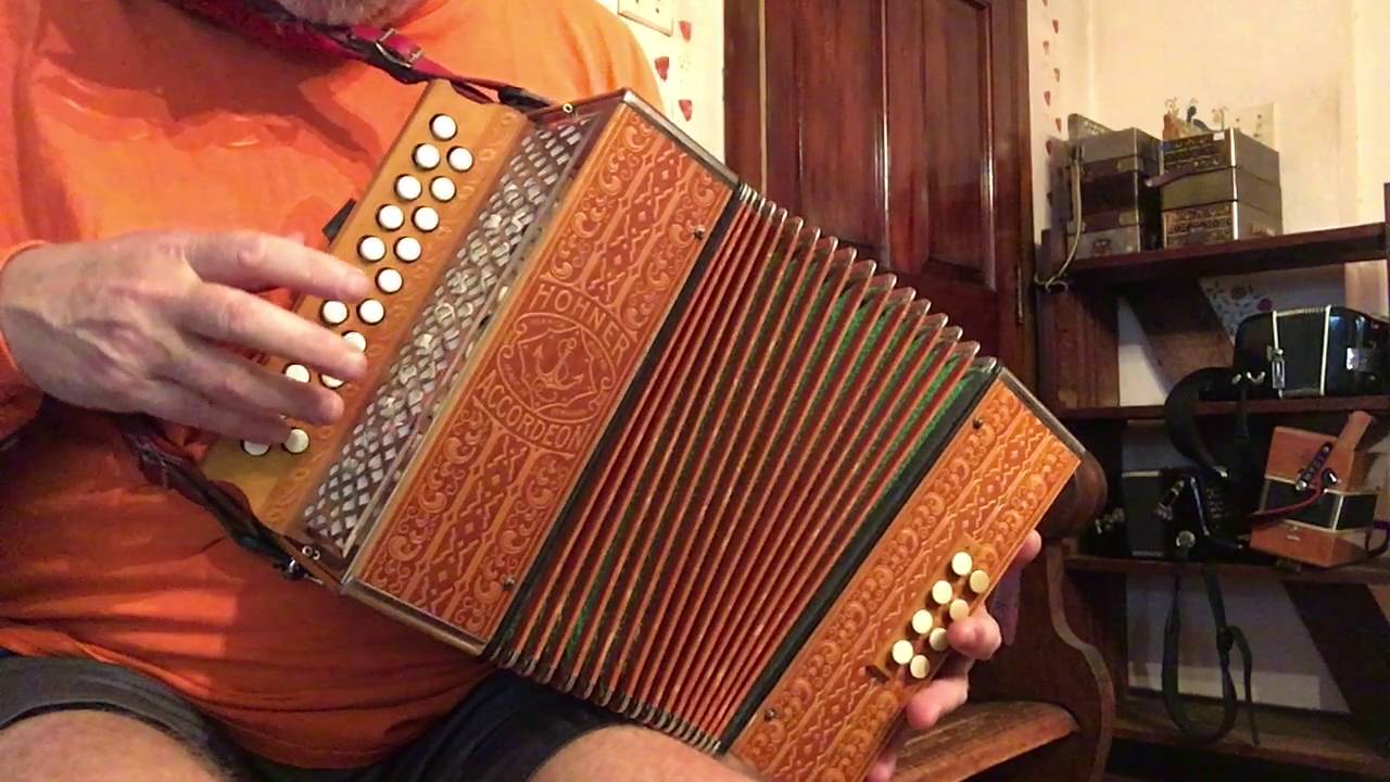 Hohner blond pressed-wood button accordion in AD #252 (sold)
