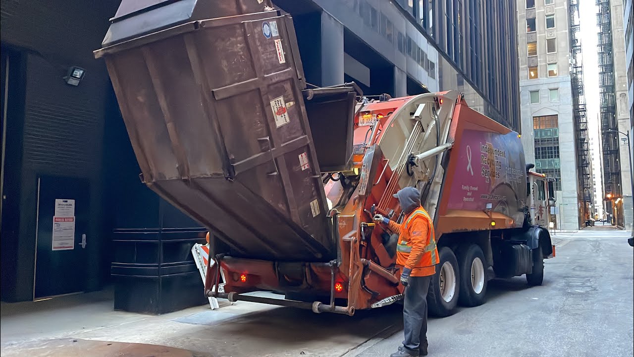 IRS Mack McNeilus Rear Loader Garbage Truck on Downtown Chicago Commercial
