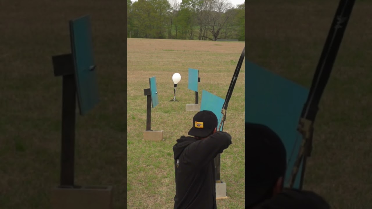 Bouncing an arrow 3 times before popping the balloon #archery #trickshot