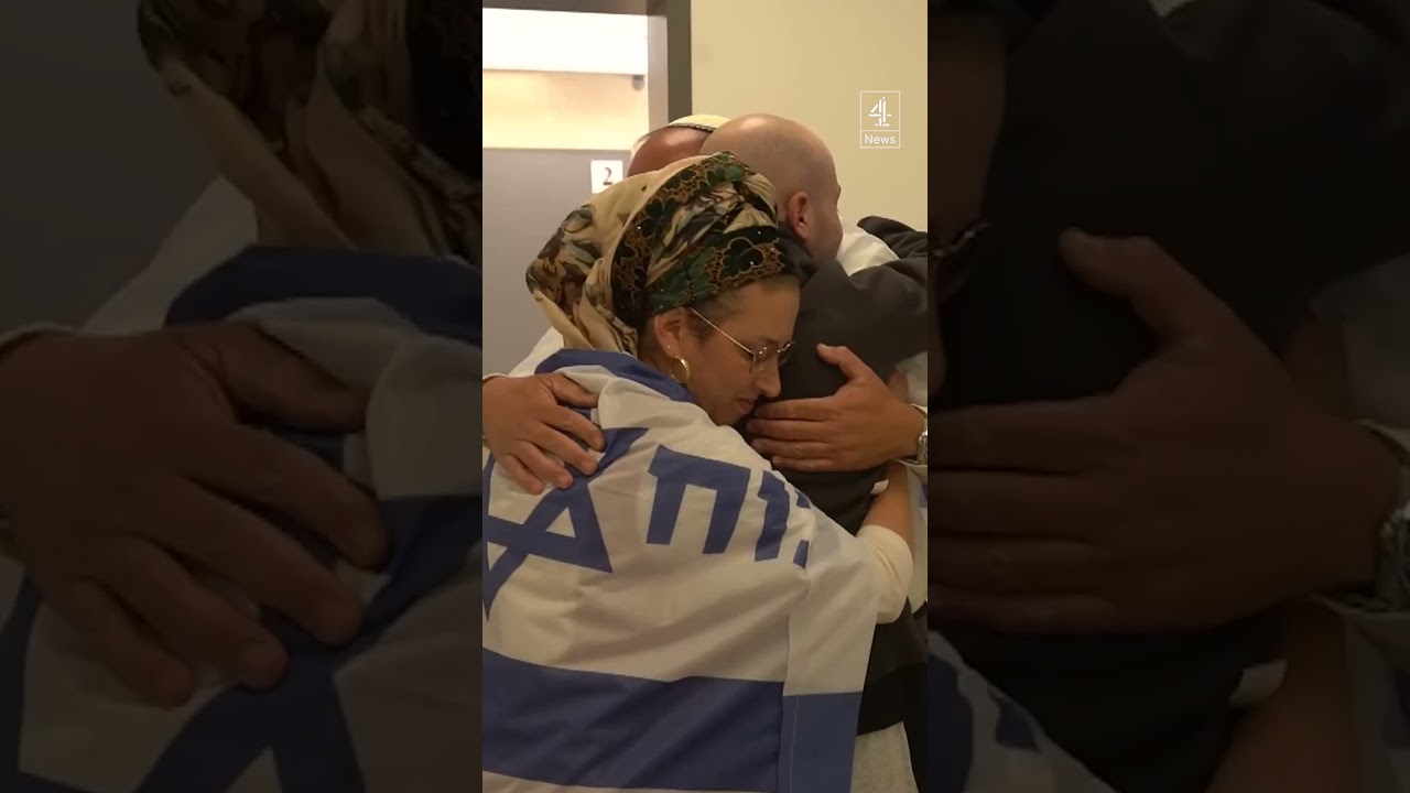 Israeli hostage reunites with family