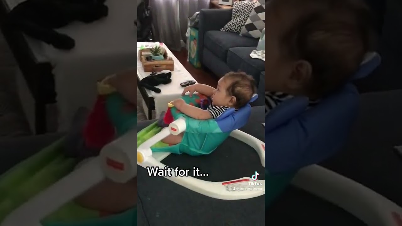 Baby boy reacts to Whitney Houston singing!