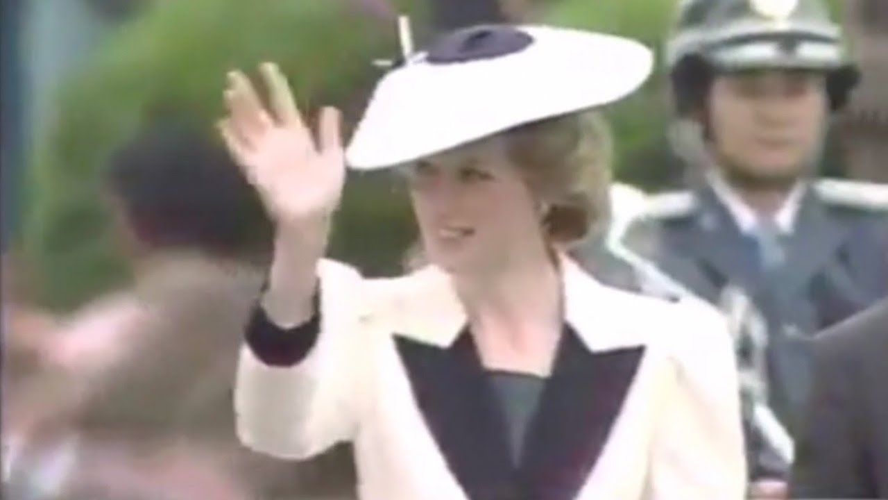 Princess Diana and Prince Charles are driven in a motorcade through Tokyo, Japan (1986)