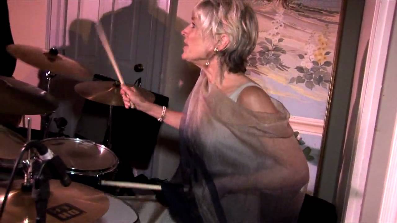 Mother of the Bride playing drums