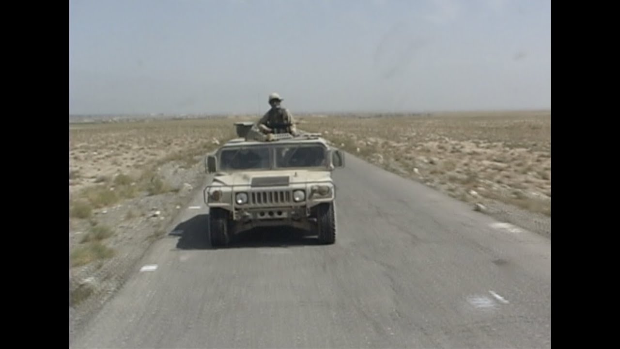 Driving on Highway from Bagram Air Field to Kabul, Afghanistan in a U.S. military convoy June 2002