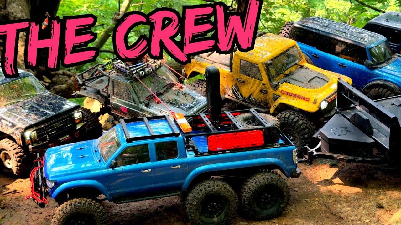RC Crawlers On A Group Cliffside Climb