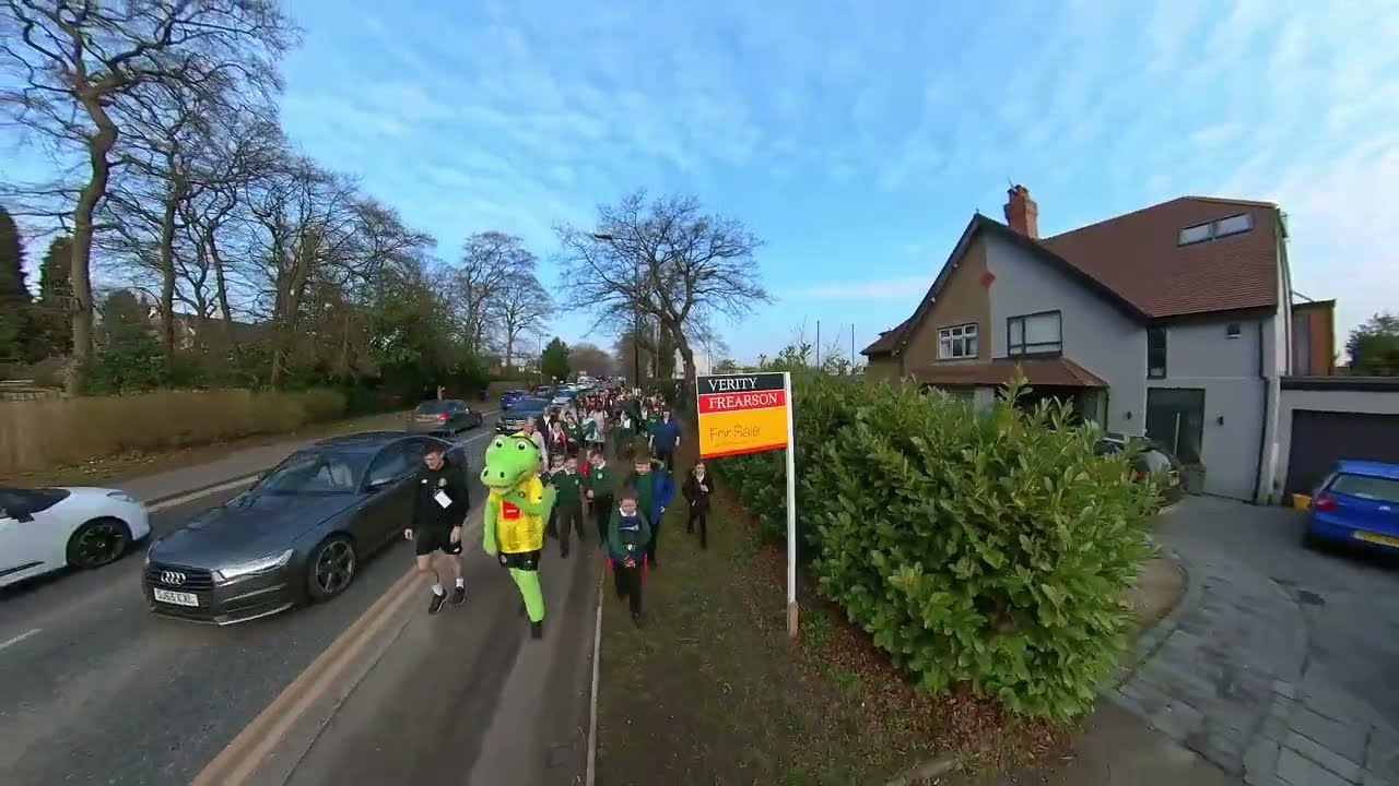 Walk to School Day - Willow Tree Children walk to school with Harry Gator