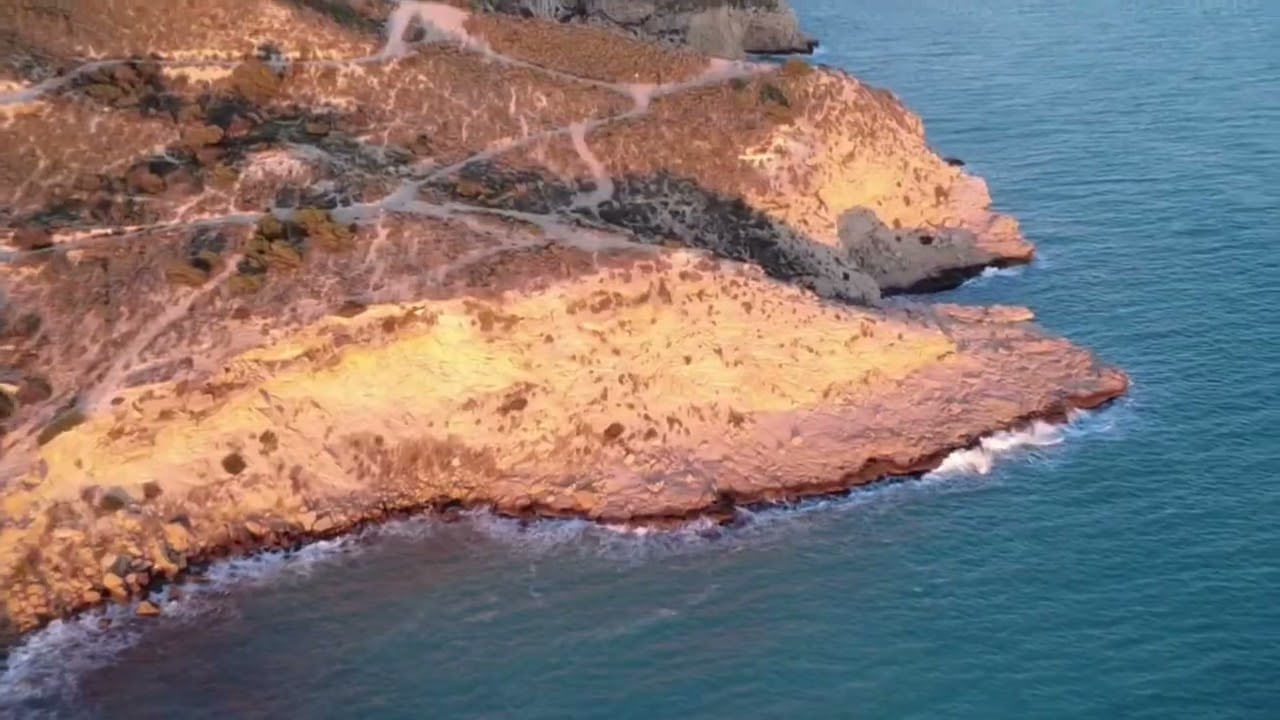 🌊✨Playa del Torres — wild cliffs, crystal water,  pure Mediterranean freedom.Shot on DJI Mini 4K 🇪🇸