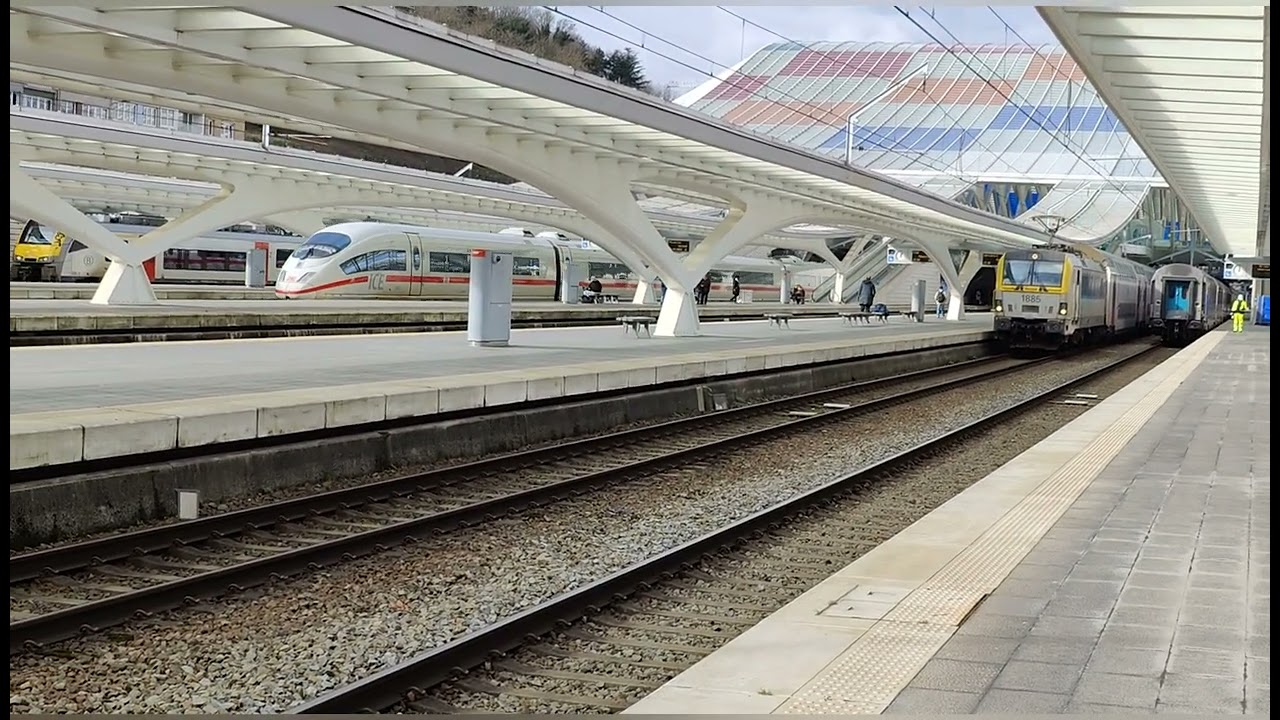 A Dutch ICE in Belgium and many more trains around Liège.