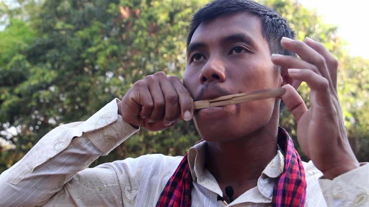 Chi Monivong plays bamboo Angkuoch