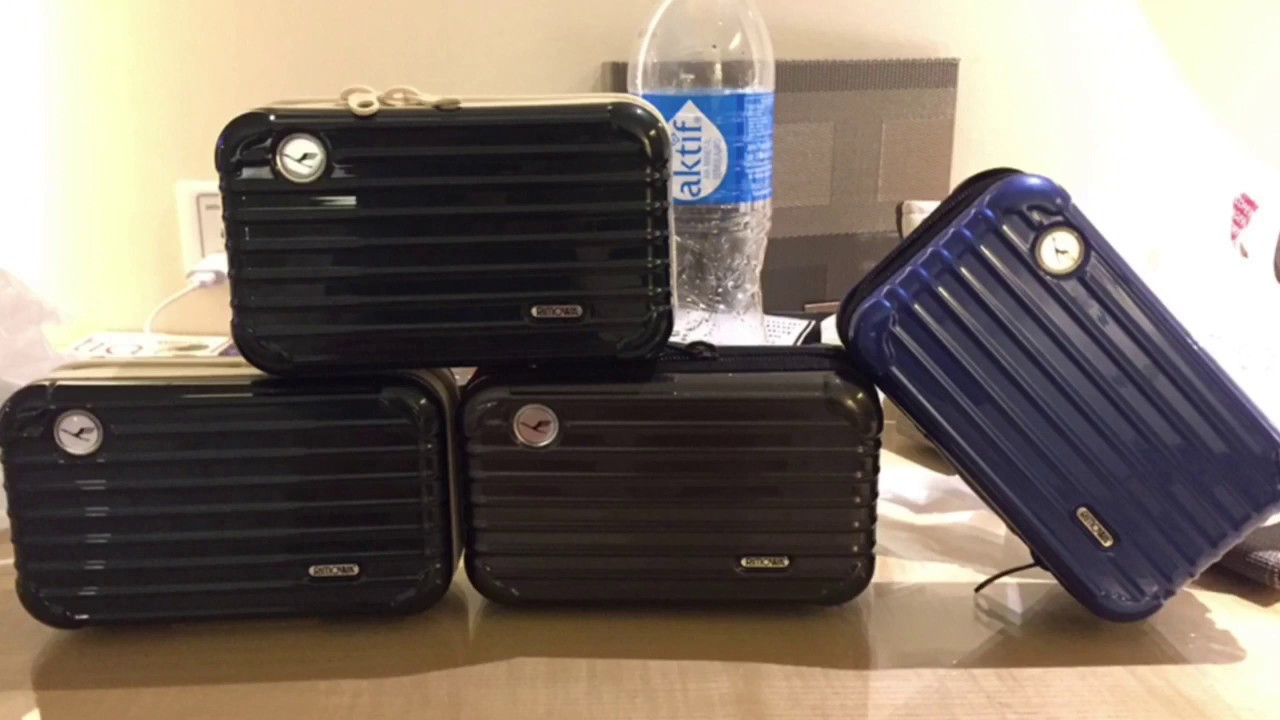 Lufthansa vs Thai First Class amenity kits by Rimowa. Lufthansa And Thai Royal first Rimowa kits