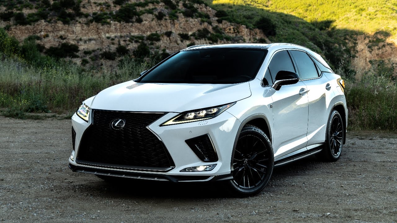LEXUS RX 350 F SPORT WITH A WHITE EXTERIOR, RED INTERIOR AND BLACK RIM