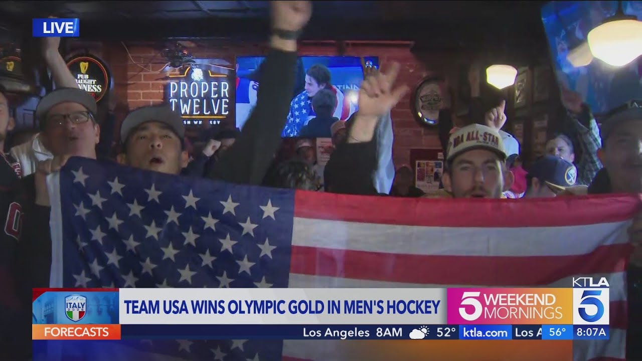Fans celebrate U.S. victory over Canada in Olympic gold medal hockey matchup at Santa Monica pub