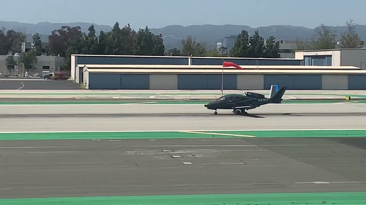 Cirrus g2 vision jet takes off out of Santa Monica airport